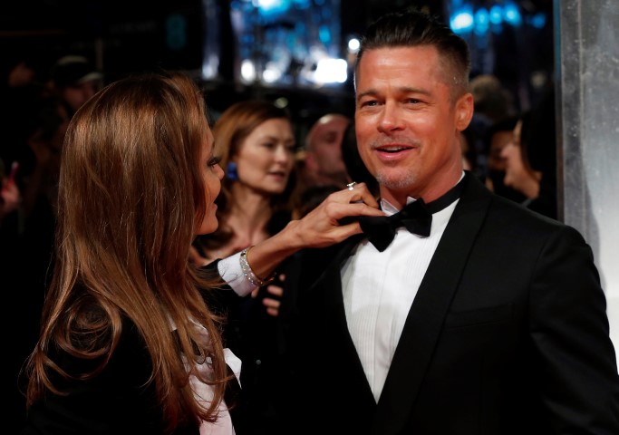 Actors Brad Pitt and Angelina Jolie arrive at  the British Academy of Film and Arts awards ceremony in London